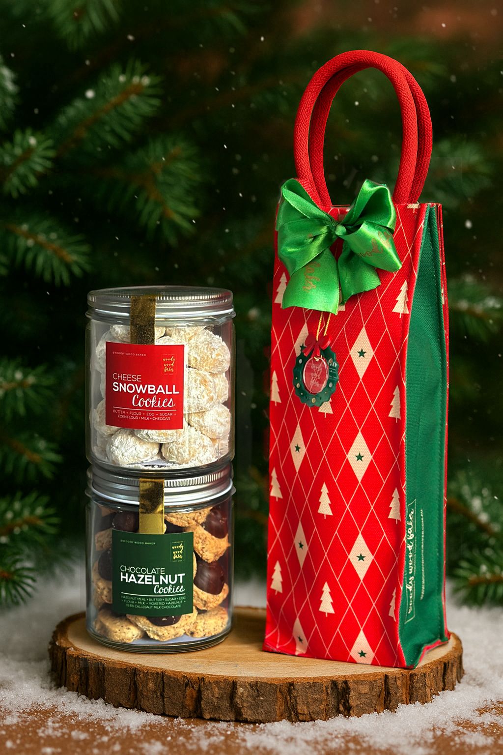 Biscotteria in Vetro Christmas gift — two jars of cookies in a reusable wine-style bag