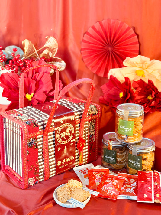 A Chinese New Year cookie hamper with three jars of cookies and a pouch of fortune butter cookies. Designed for sharing and family celebrations.