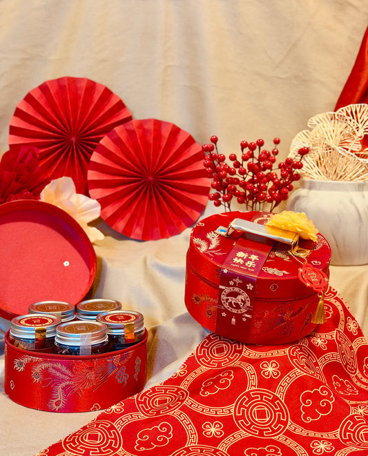 Chinese New Year Treasure of Harmony cookie hamper with five small cookie jars in a festive red round gift box